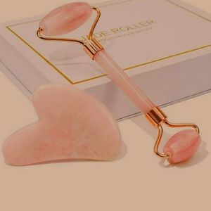Brand new facial roller and Gua  Sha. Rose Quartz. Unopened